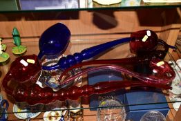 A LARGE BRISTOL BLUE GLASS PIPE, length 57cm (cracks along rim) together with three similar