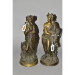 A PAIR OF 19TH CENTURY CONTINENTAL BRONZE FIGURES, in the form of a classical male holding a