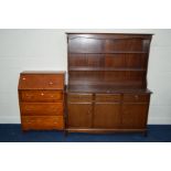 A STAG MINSTREL DRESSER, with three drawers, width 141cm x depth 46cm x height 172cm, together