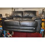 A BLACK LEATHER TWO SEATER SOFA, width 145cm (no feet)