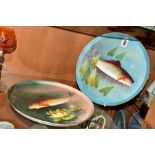 A PAIR OF LIMOGES CIRCULAR TRAYS/PLATTERS, decorated with Fish, diameters 29cm (2)