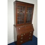 AN EDWARDIAN OAK LEAD GLAZED BUREAU BOOKCASE, width 98cm x depth 44cm x height 199cm