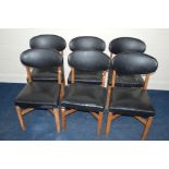 A SET OF SIX MID 20TH CENTURY LEATHERETTE COVERED CHAIRS with oval backs and cross stretchered