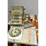 A BRUNSVIGA MECHANICAL CALCULATOR, together with Smith's electric clock, Chinese satellite