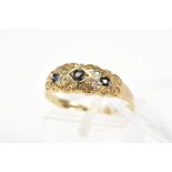 A 9CT GOLD SAPPHIRE AND DIAMOND RING, designed as three graduated circular cut sapphires within a