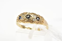 A 9CT GOLD SAPPHIRE AND DIAMOND RING, designed as three graduated circular cut sapphires within a