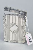 A LATE VICTORIAN SILVER CARD CASE OF WAVY RECTANGULAR OUTLINE, foliate engraved and engine turned