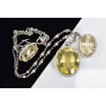 AN 18CT WHITE GOLD, CITRINE AND DIAMOND PENDANT AND MATCHING EARRINGS, the pendant designed as a