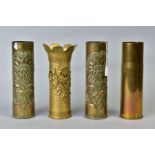 FOUR BRASS SHELL CASES, three of which are trench art, to include one named and dated PAISSY1917