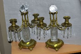 A PAIR OF GILT METAL AND CRYSTAL CANDELABRA, each consisting of two arms attached to a central