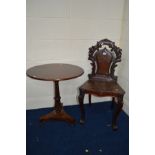 A VICTORIAN MAHOGANY HALL CHAIR, on cabriole front legs, together with a Victorian circular topped