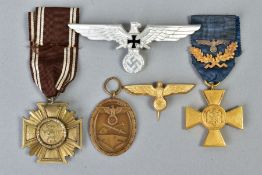 THREE GERMAN 3RD REICH MEDALS/CAP devices to include a German Wehrmakt 25 yr service medal, with