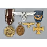 THREE GERMAN 3RD REICH MEDALS/CAP devices to include a German Wehrmakt 25 yr service medal, with