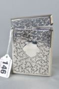 AN EDWARDIAN SILVER RECTANGULAR CARD CASE, foliate engraved decoration, shield shaped cartouche,