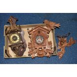A 20TH CENTURY BLACK FOREST CUCKOO CLOCK, Stag's head pediment loose and s.d to antlers, plastic