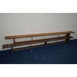 TWO EARLY 20TH CENTURY SIMILAR PINE BENCHES, longest length 353cm, shortest bench with circular