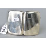 A GEORGE V SILVER CIGARETTE CASE OF RECTANGULAR FORM, engine turned decoration, vacant cartouche,