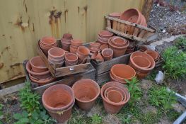 SIX VARIOUS WOODEN CRATES containing various period and new various sized terracotta plant pots (