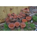 SIX VARIOUS WOODEN CRATES containing various period and new various sized terracotta plant pots (