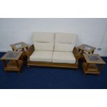 A MODERN CROSS RATTAN FIVE PIECE CONVERSATORY SUITE with oatmeal removable cushions, comprising a