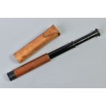 A WWI/II ERA LAWRENCE & MAYO 'SCOUTSCOPE' small scope metal and leather construction, with tan