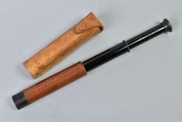 A WWI/II ERA LAWRENCE & MAYO 'SCOUTSCOPE' small scope metal and leather construction, with tan