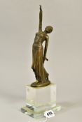 AN ART DECO STYLE BRONZE FIGURE OF A LADY, one arm raised, signed Masier, mounted on a glass base,