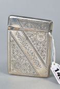 A LATE VICTORIAN SILVER CARD CASE OF RECTANGULAR FORM, foliate engraved decoration, vacant cartouche