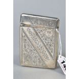 A LATE VICTORIAN SILVER CARD CASE OF RECTANGULAR FORM, foliate engraved decoration, vacant cartouche