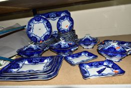 F & SONS OF BURSLEM 'DOUGLAS' FLOW BLUE DINNER SERVICE, comprising of twelve 27cm plates, twelve