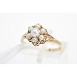 A 9CT GOLD SPLIT PEARL CLUSTER RING, designed as a tiered cluster of claw set split pearls to the