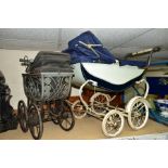 A ROSLYN DOLLS PRAM, appears largely complete, some damage to hood, in need of some refurbishment,