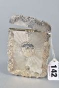 AN EARLY VICTORIAN SILVER CARD CASE OF WAVY RECTANGULAR FORM, engine turned and foliate engraved,
