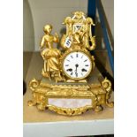 A LATE 19TH CENTURY GILT METAL FIGURAL MANTEL CLOCK, cast as a lady gardener, enamel circular dial