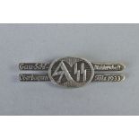 WWII GERMAN S.A./S.S. RALLY BADGE/TINNIE, design features a pair of parallel skis with centre