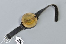 A WWII ERA 3RD REICH GERMAN LUFTWAFFE PILOT/CREW WRIST COMPASS, large circular dial liquid filled,