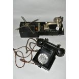 A PETER PAN PORTABLE GRAMOPHONE with a black bakelite G.P.O. telephone, No 332, version with tray,
