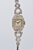 AN EARLY 20TH CENTURY PLATINUM AND 18CT CRUSADER COCKTAIL WATCH, silvered dial with Arabic numerals,