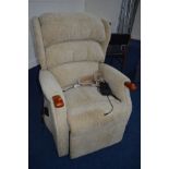 A CELEBRITY ELECTRIC RISE AND RECLINE ARMCHAIR