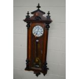 A LATE 19TH CENTURY MAHOGANY AND EBONISED VIENNA WALL CLOCK, the white dial with Roman numerals
