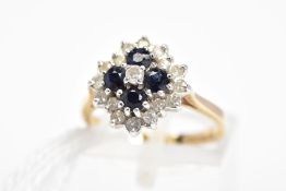 A 9CT GOLD SAPPHIRE AND DIAMOND CLUSTER RING, the three tier cluster designed as a central brilliant
