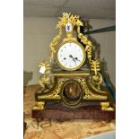 A FRENCH EMPIRE ORMOLU AND LACQUERED METAL MANTEL CLOCK, some damage, finial of a basket of fruit