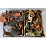 TWO BOXES CONTAINING A LARGE NUMBER OF LEATHER AND CANVAS HOLSTERS for pistols, revolvers etc,