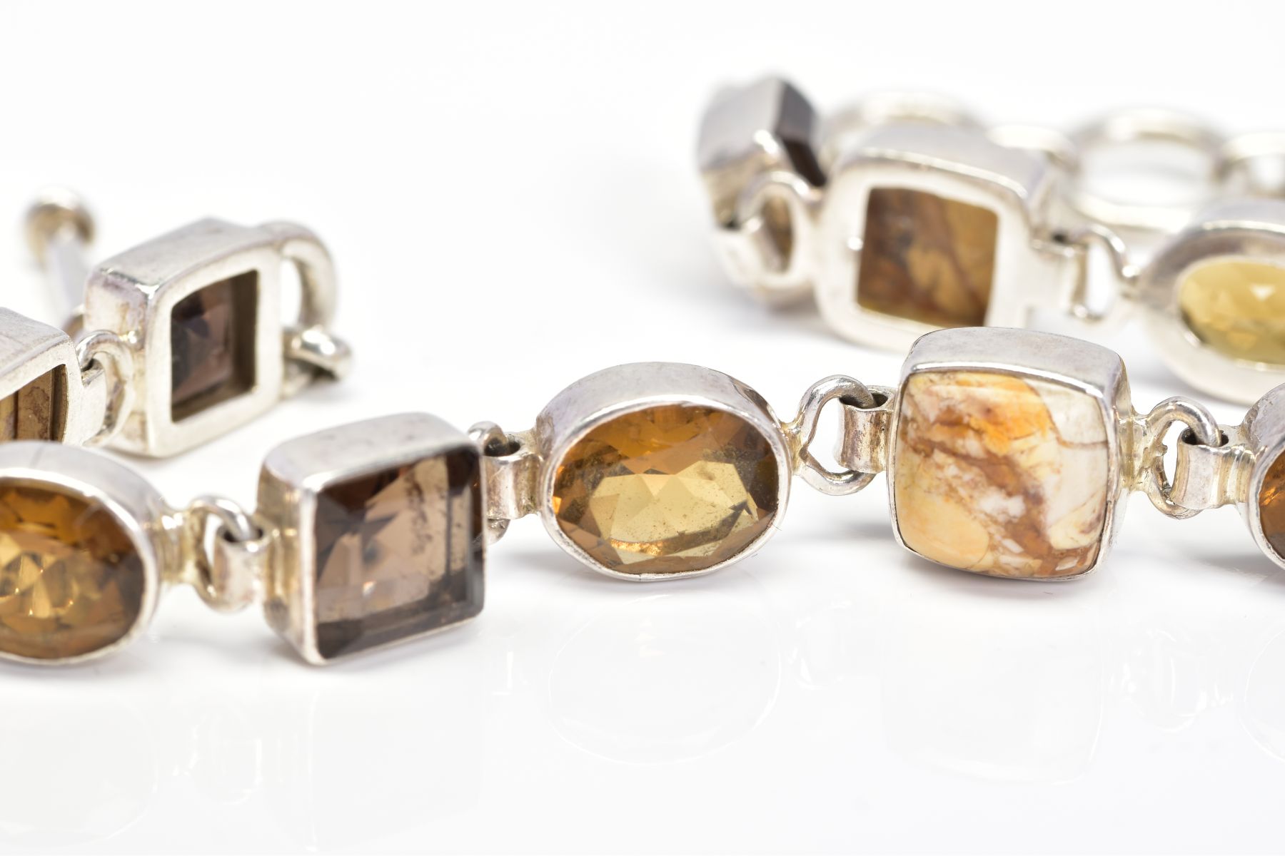 A MULTI GEM BRACELET, designed with collet set gems including square smokey quartz and oval citrine, - Image 3 of 3