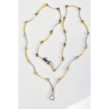 A MODERN DIAMOND CENTREPIECE NECKLET, consisting of yellow and white alternating wave polished panel