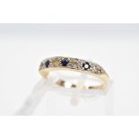 A 9CT GOLD SAPPHIRE AND CUBIC ZIRCONIA RING, designed as a line of four colourless cubic zirconias