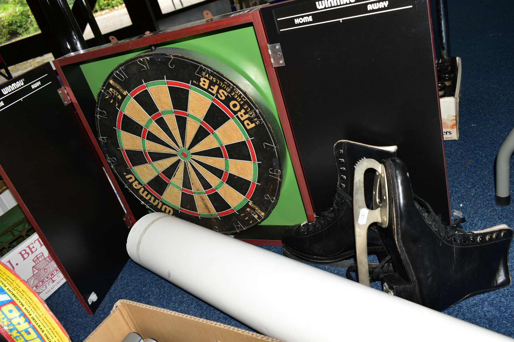 AN WINMAU PRO SFB DARTBOARD, contained in a wall mounted cabinet with double doors with chalk boards