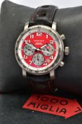A STAINLESS STEEL CHOPARD 1000 MIGLIA CHRONOGRAPH AUTOMATIC WRISTWATCH, red dial with bold Arabic