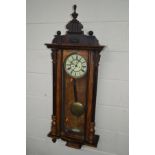 A LATE 19TH CENTURY WALNUT VIENNA WALL CLOCK, the enamel dial with Roman numerals and seconds