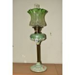 A LATE 19TH CENTURY OIL LAMP, wavy green, opaque and clear acid etched shade, iridescent and pale